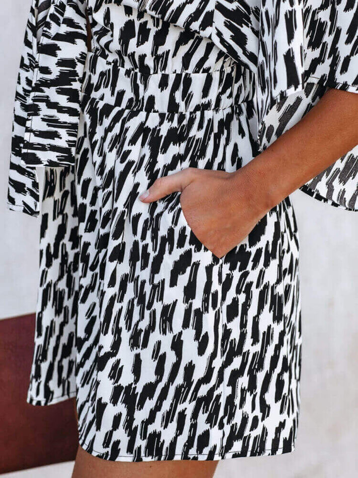 V-Neck Printed Pocketed Tie Romper