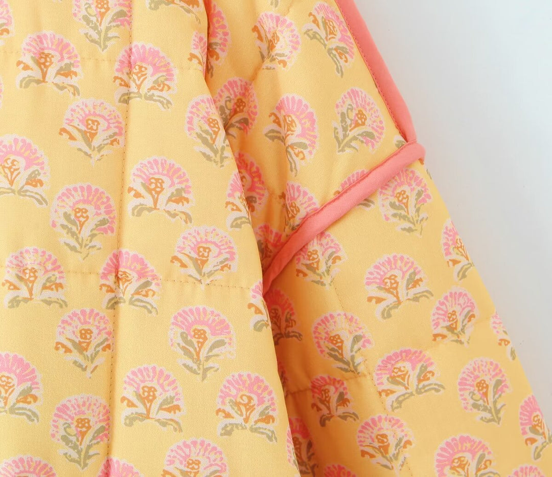 Jacket with patchwork and floral print and standing collar