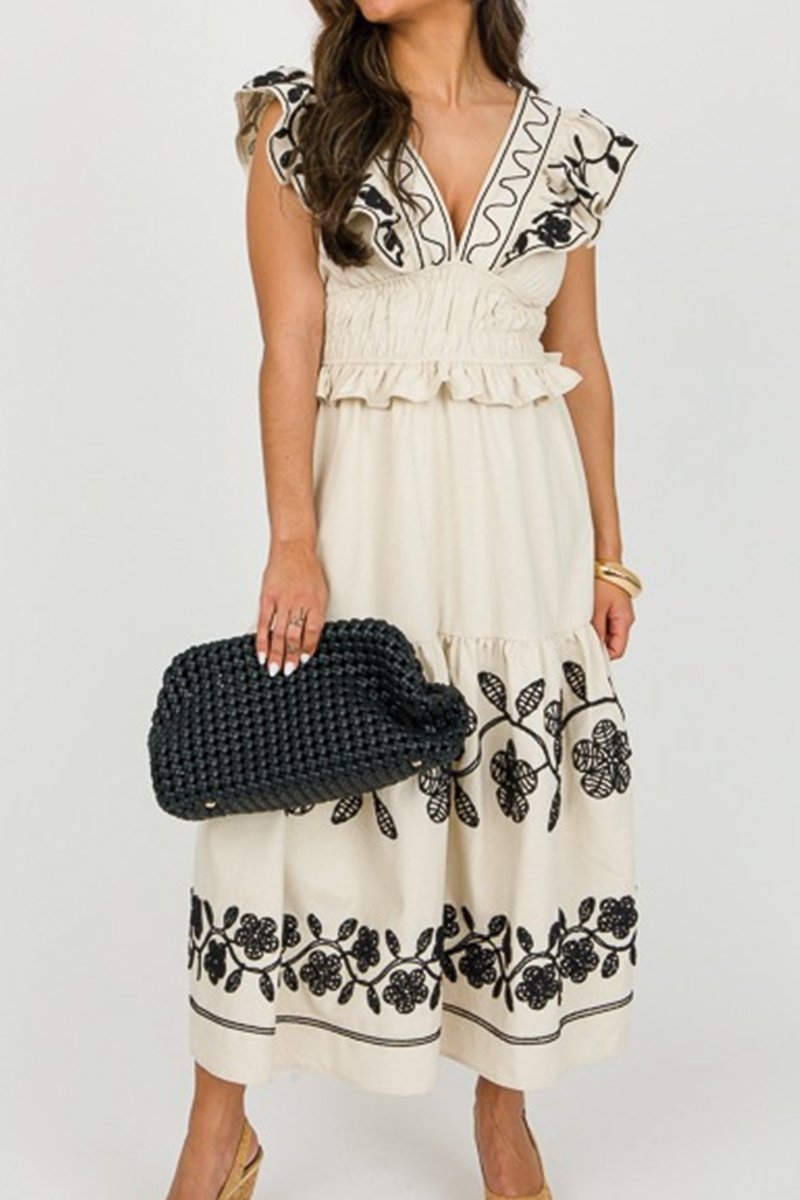 Contrast embroidered dress